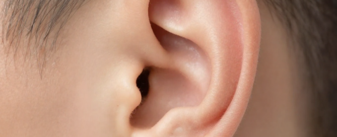 Close-up of healthy human ear with natural lighting representing auditory wellness and hearing health