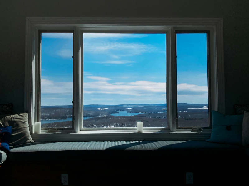 Open window revealing a clear horizon in the distance, symbolizing openness and future opportunities.